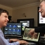 Discussing research results at the office - Animated Language Learning